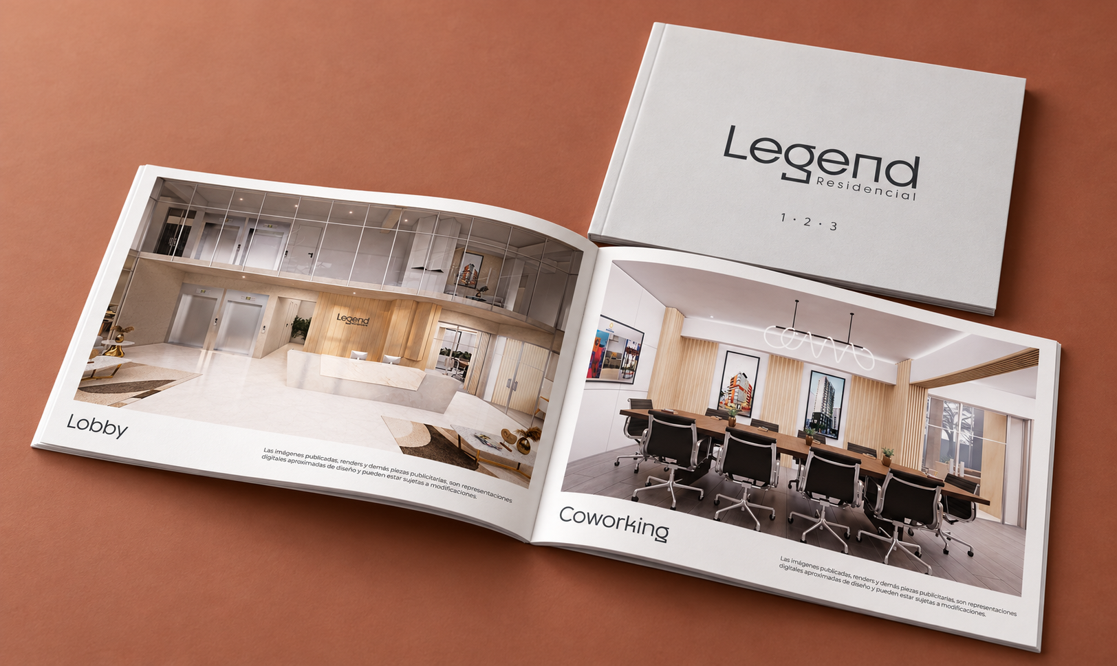 Brochure de Legend Residencial abierto en las páginas del lobby y el coworking, junto a su portada sobre un fondo terracota