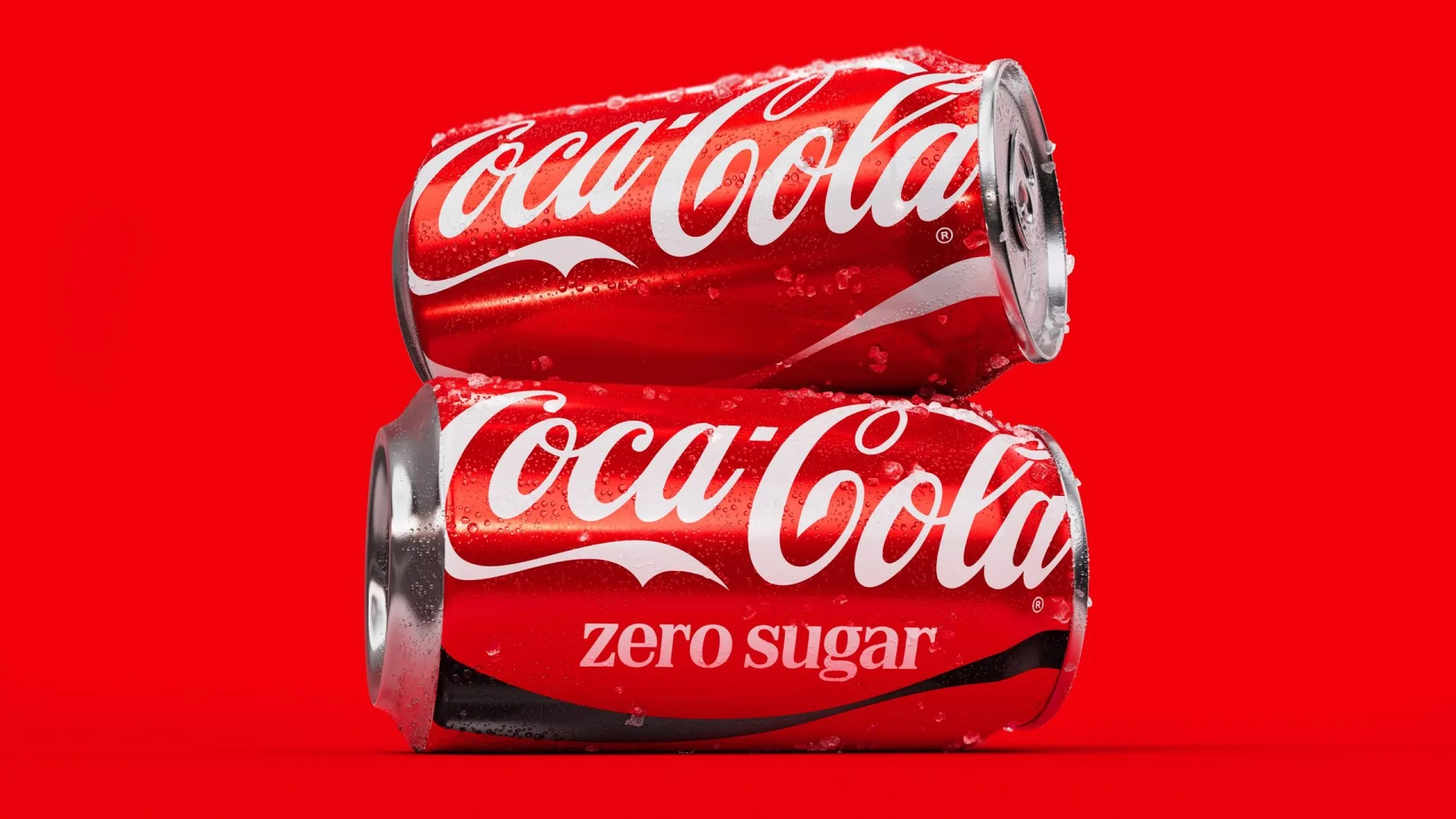 Latas de Coca-Cola Original y Zero Sugar con la identidad de 2026.